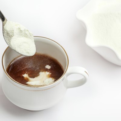 Cup of tea with dairy milk powder