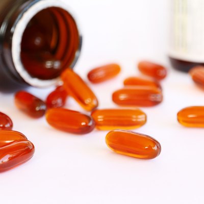 gel vitamin supplements on white