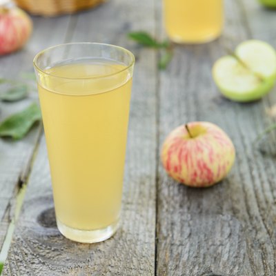 Fresh homemade apple juice and apples