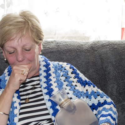 Mature woman with cold and flu