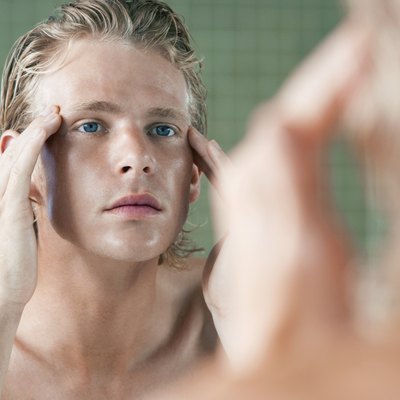 Man Applying Facial Cream