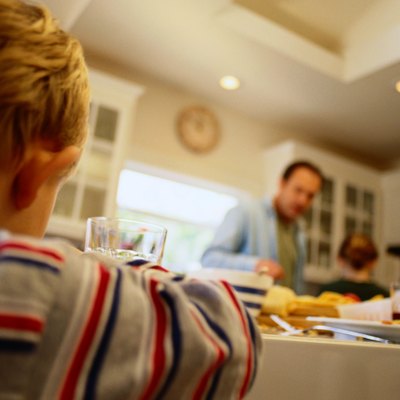 Boy Sitting at the Kitchen Table
