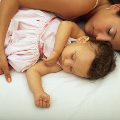 Mother and daughter napping