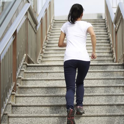woman running on stone stairs