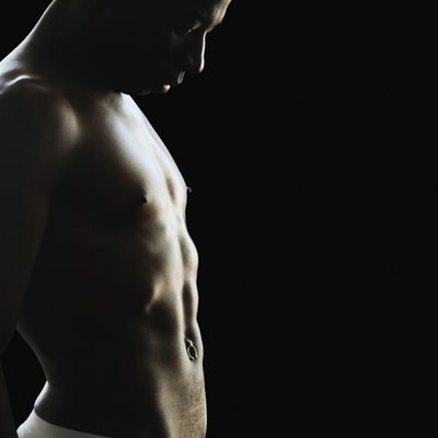 Studio shot of African man with bare chest