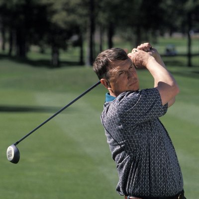Man Swinging a Golf Club