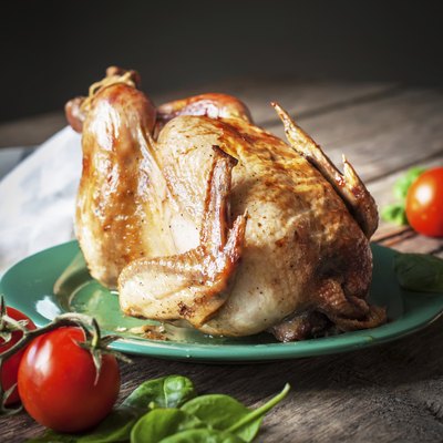 Baked Whole Chicken with vegetables, square image