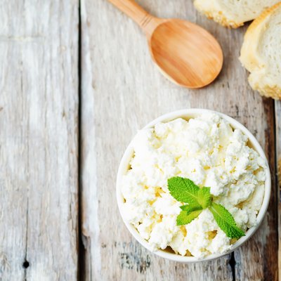 homemade ricotta with bread decorated with mint