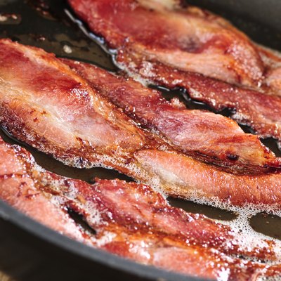 Bacon frying in a pan
