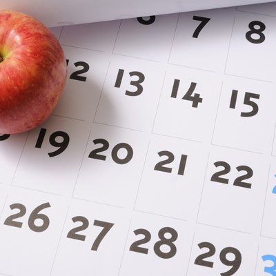 Red apple on calendar