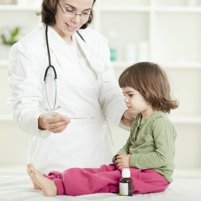 Little girl visiting a pediatrician
