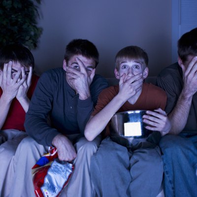 Group of people covering their face