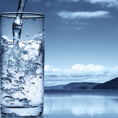 Pouring water into a glass