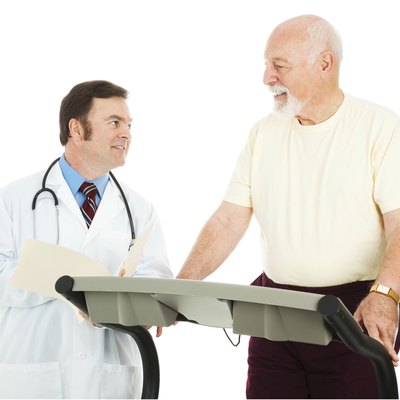 Fit Senior Man Consults Doctor