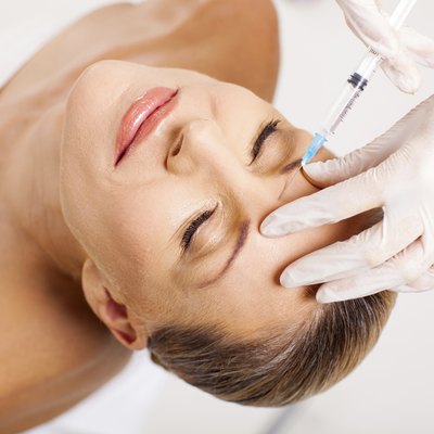 cosmetic injection to senior woman