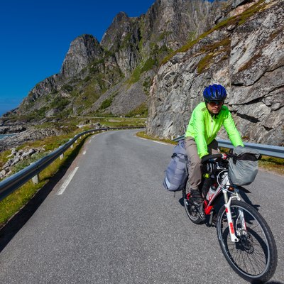 Biking in Norway against picturesque landscape