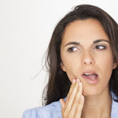 Beautiful woman having toothache