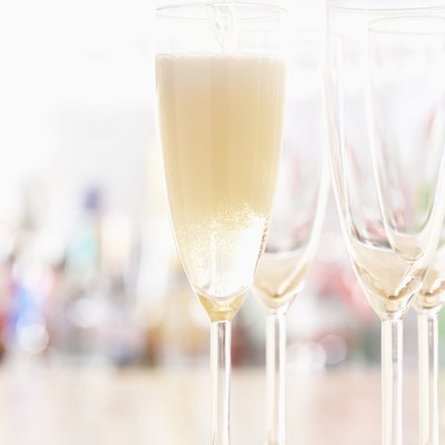 Champagne pouring into glasses