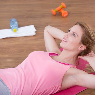 Fit woman doing crunches