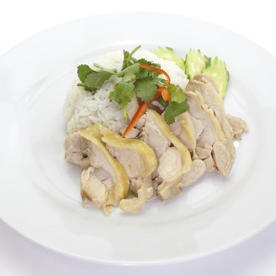 hainanese food chicken steamed rice and vegetables