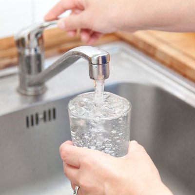 woman tap water