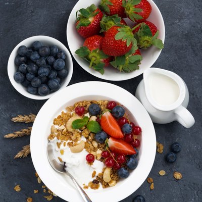 baked muesli with fresh berries and yogurt for breakfast