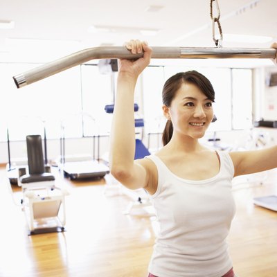 Young woman exercising in a gym