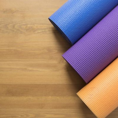 Yoga mats on the wood table