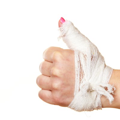 Hand tied elastic bandage on a white background
