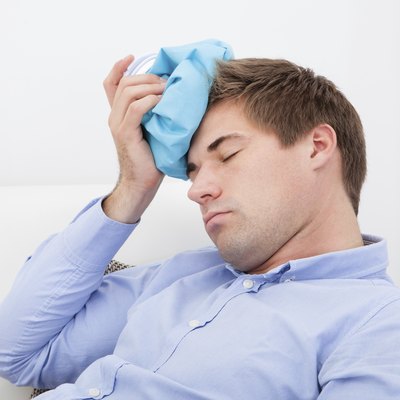 Man Suffering With Headache