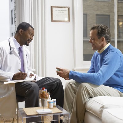 Doctor Discussing Medicine in His Clinic With a Patient