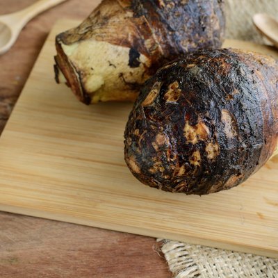 taro root on old wooden table