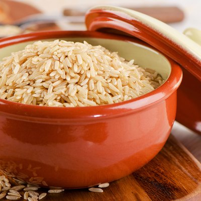 brown rice in a bowl .