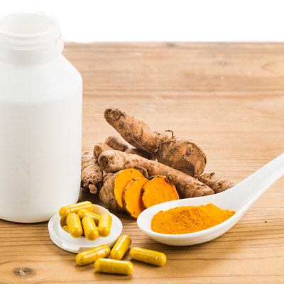 Homemade turmeric capsule from freshly grounded turmeric roots.