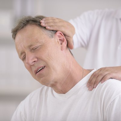 Chiropractic: Chiropractor doing neck adjustment