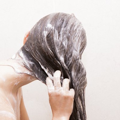 Woman washing her hair