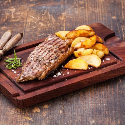 Steak with roasted potato wedges