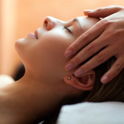 Beautiful woman having an head massage