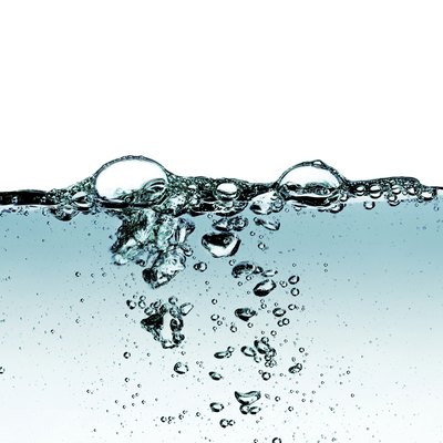 Splash of water,drops and bubbles on a white background.