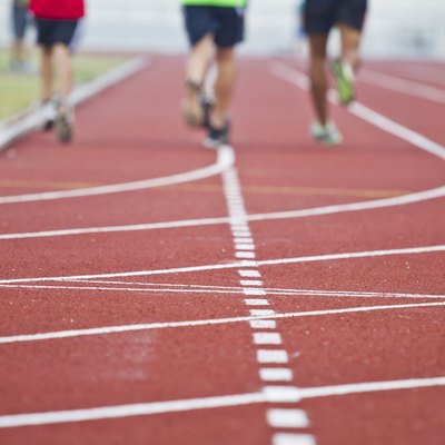 Cropped image of runner on competitive running