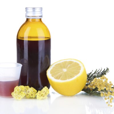 Cough syrup isolated on white