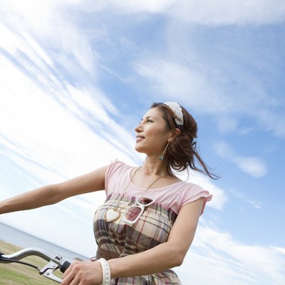 Young Woman with Bicycle