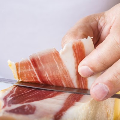 Professional cutting of serrano ham