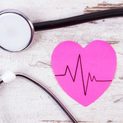 Heart of paper with cardiogram line and stethoscope