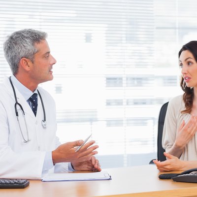 Patient talking with her doctor about illness