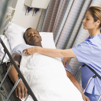 Nurse Caring For Patient