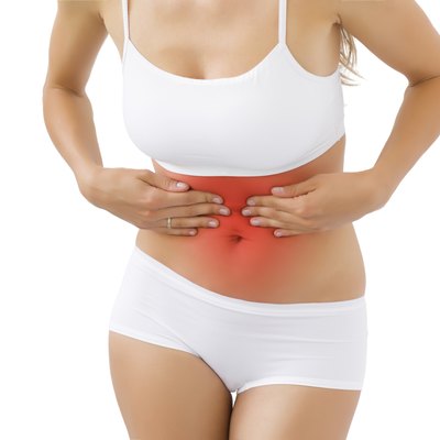 Woman having pain in stomach
