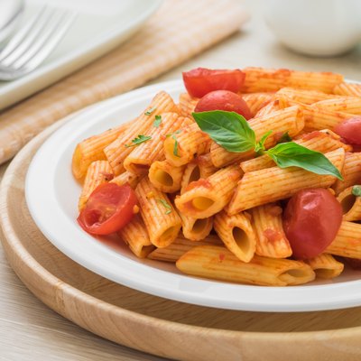 Penne pasta in tomato sauce on plate