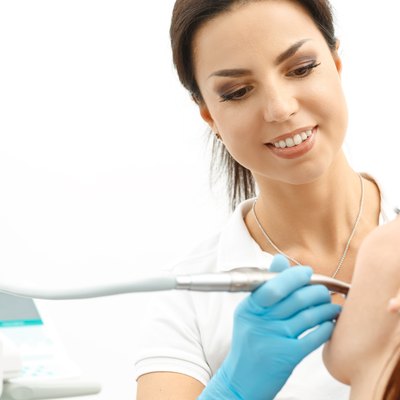 Dentist performing a dental procedure on patient