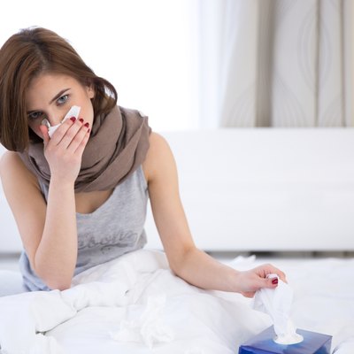 sick woman on the bed